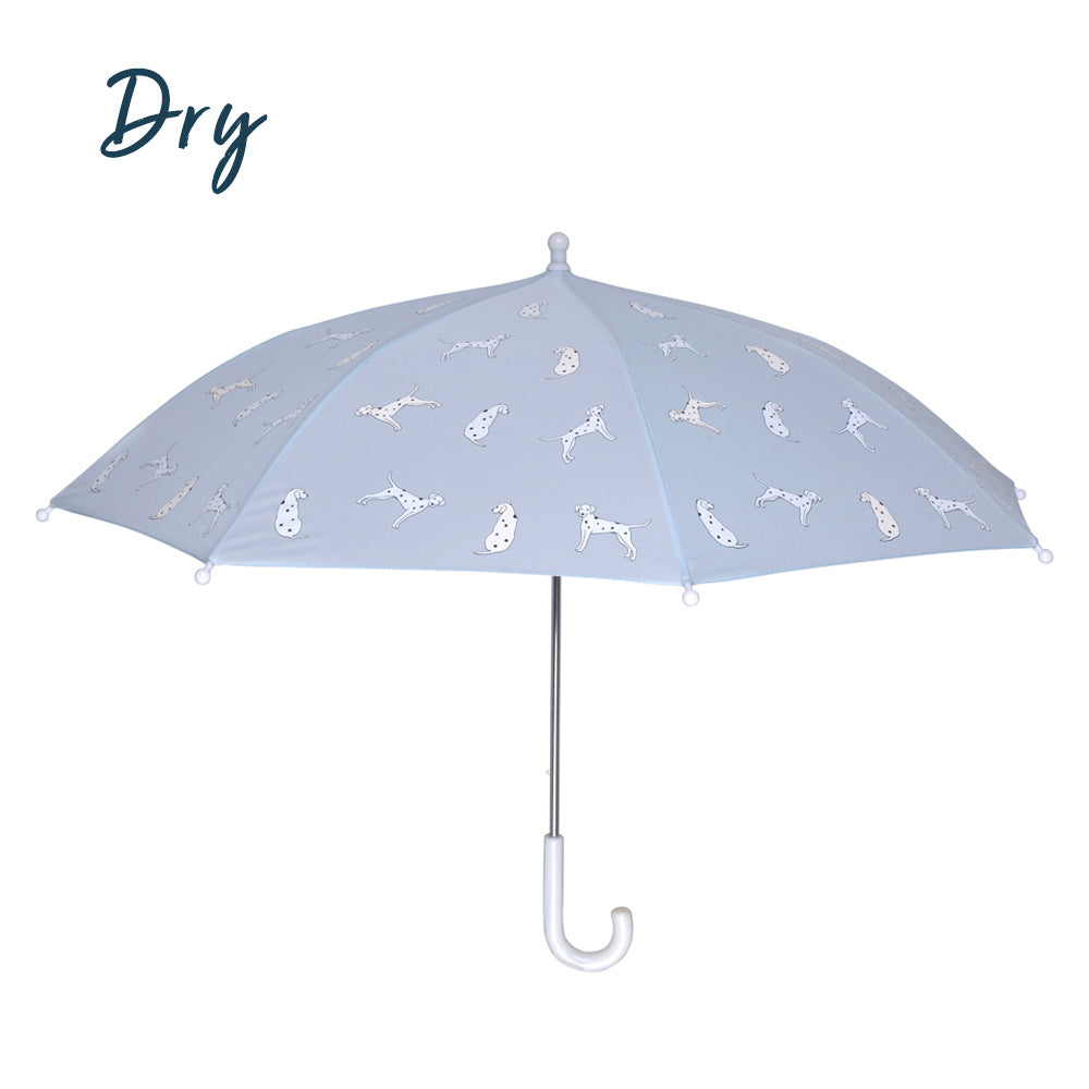 Kids light blue dalmatian color changing umbrella by Holly and Beau. Side view of the kids color changing umbrella with a dry view. Stick kids color changing umbrella.