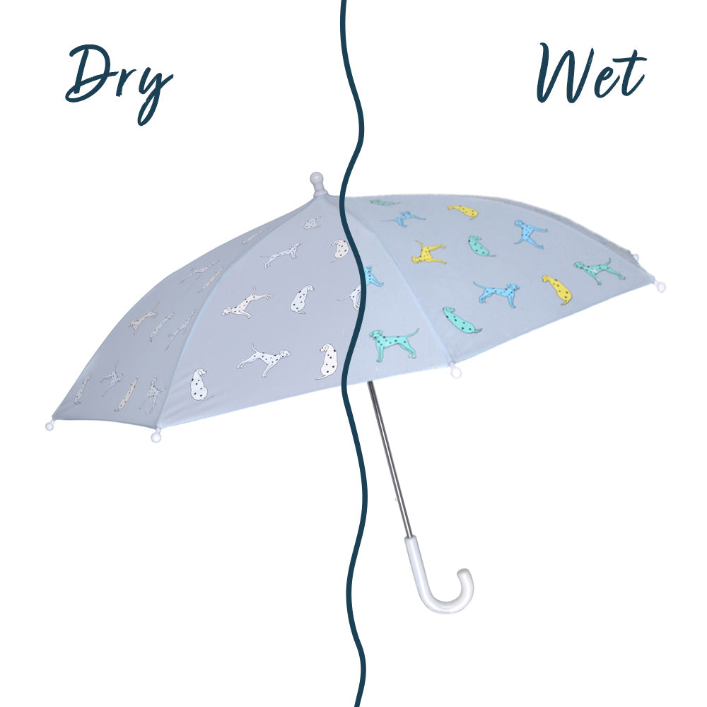 Kids light blue dalmatian color changing umbrella by Holly and Beau. Side view of the kids color changing umbrella with a wet/dry comparison. Stick kids color changing umbrella.