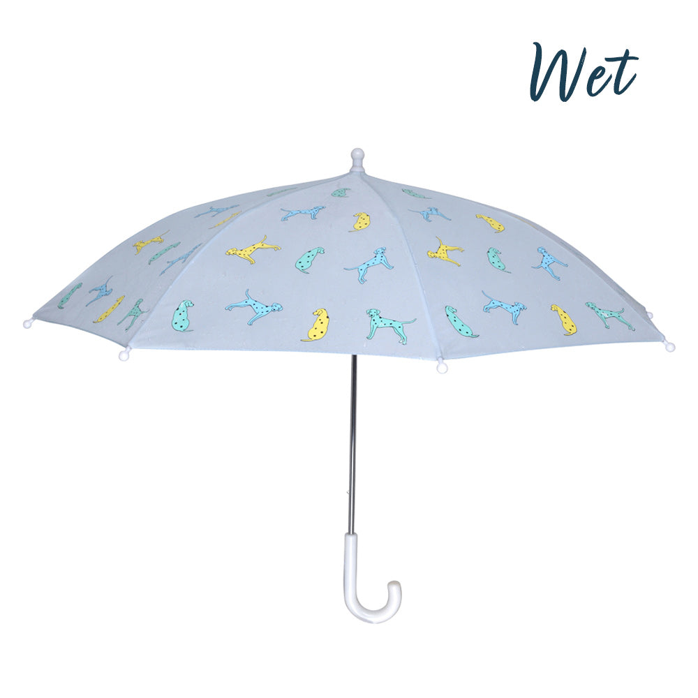 Kids light blue dalmatian color changing umbrella by Holly and Beau. Side view of the kids color changing umbrella with a wet view. Stick kids color changing umbrella.