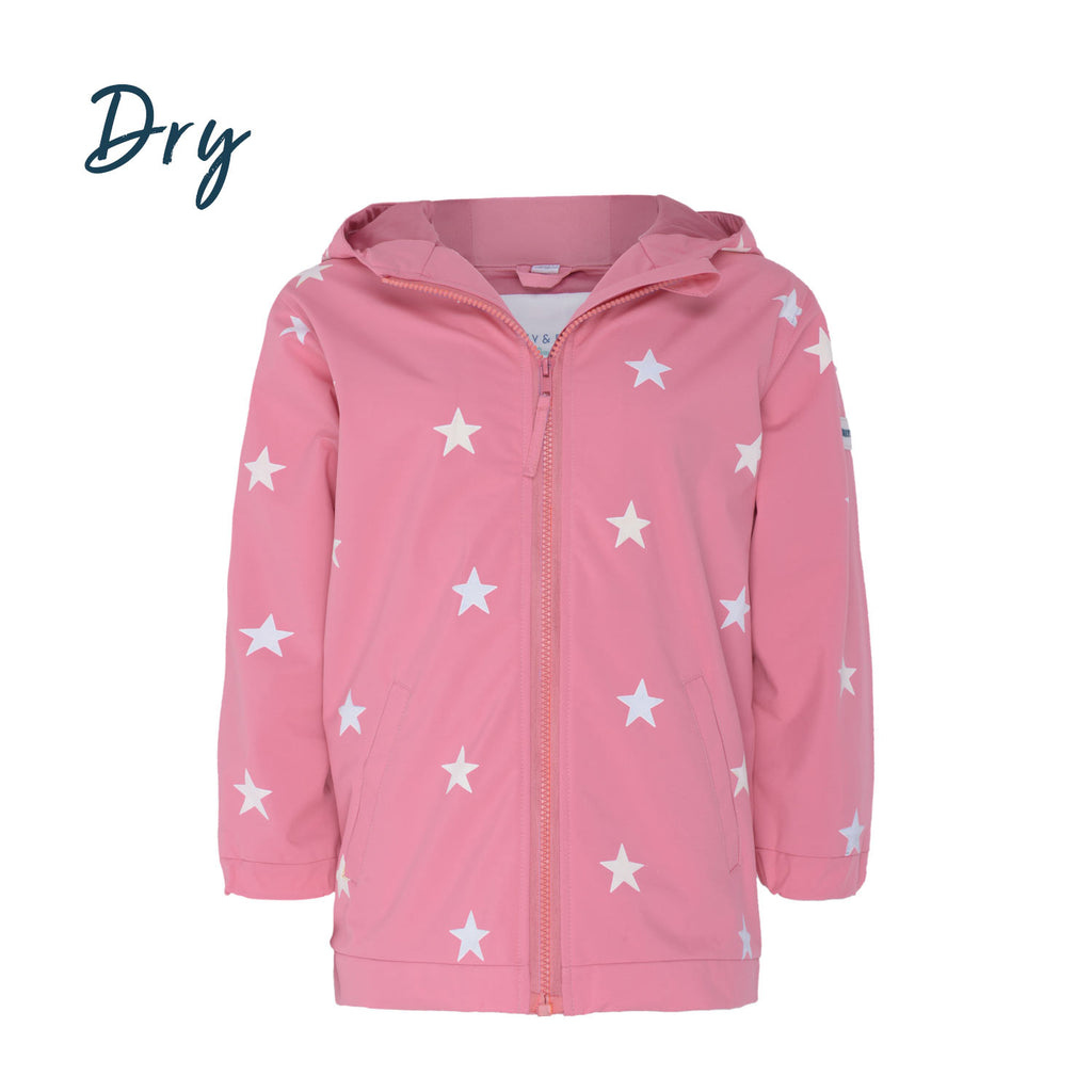 Kids color changing pink star raincoat by Holly and Beau. Front view of the dry view color changing.