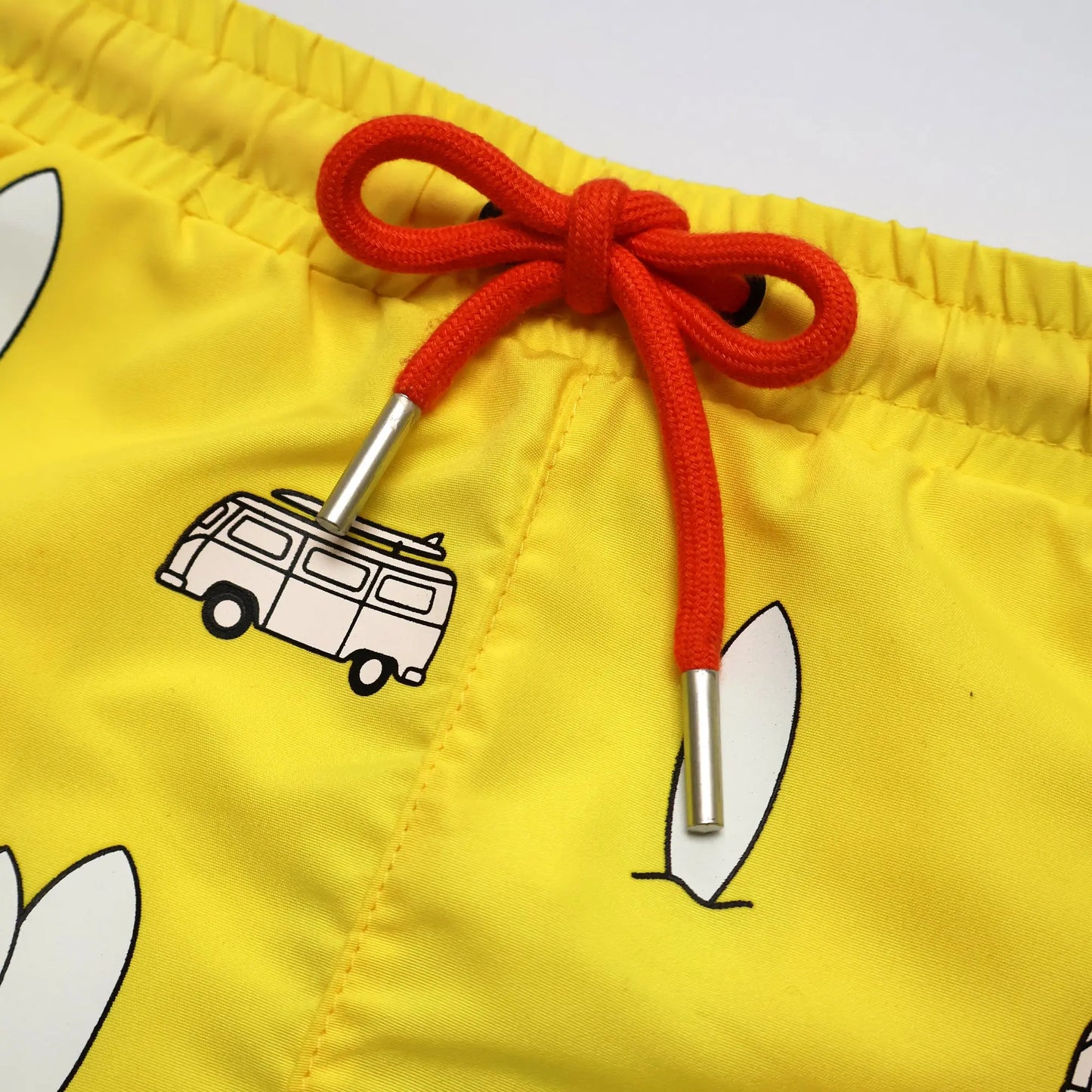 Holly and Beau Yellow surfboards boys color changing swim trunks detailed view of the drawstring