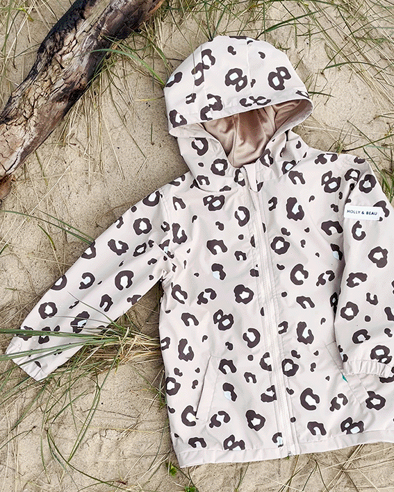 Holly and Beau Kids Leopard Print rain jacket, changes color in the rain. The best gift for little girls and boys