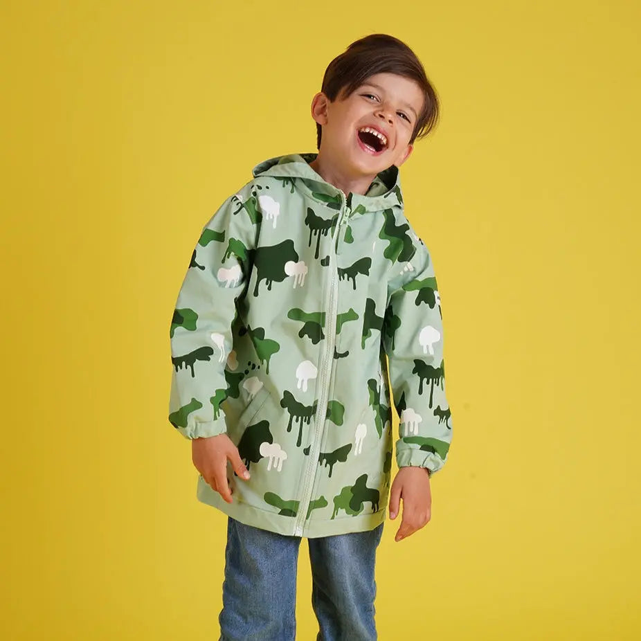 Holly and Beau Lifestyle happy kids green color changing camouflage raincoat