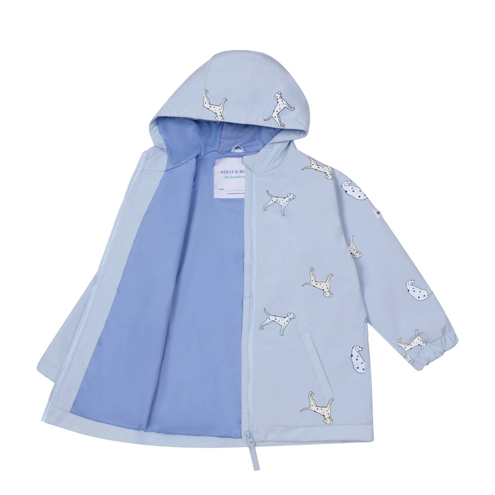 Dalmatian kids color changing raincoat by Holly and Beau. Front view showing the dry and inside lining of the color changing raincoat. Inside lining is recycled polyester.