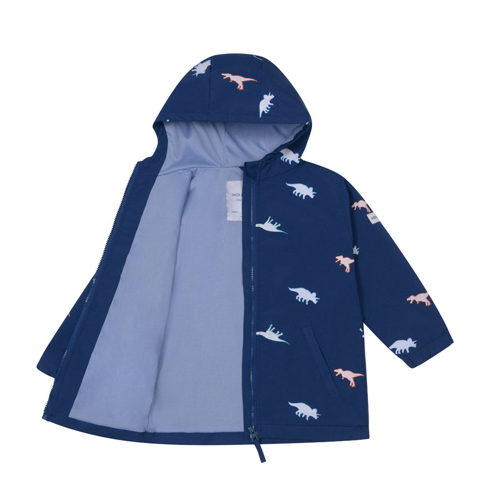 Kids dinosaur colour changing raincoat by Holly and Beau. Front view showing the dry and inside lining of the colour changing raincoat. Lining is recycled polyester fabric.