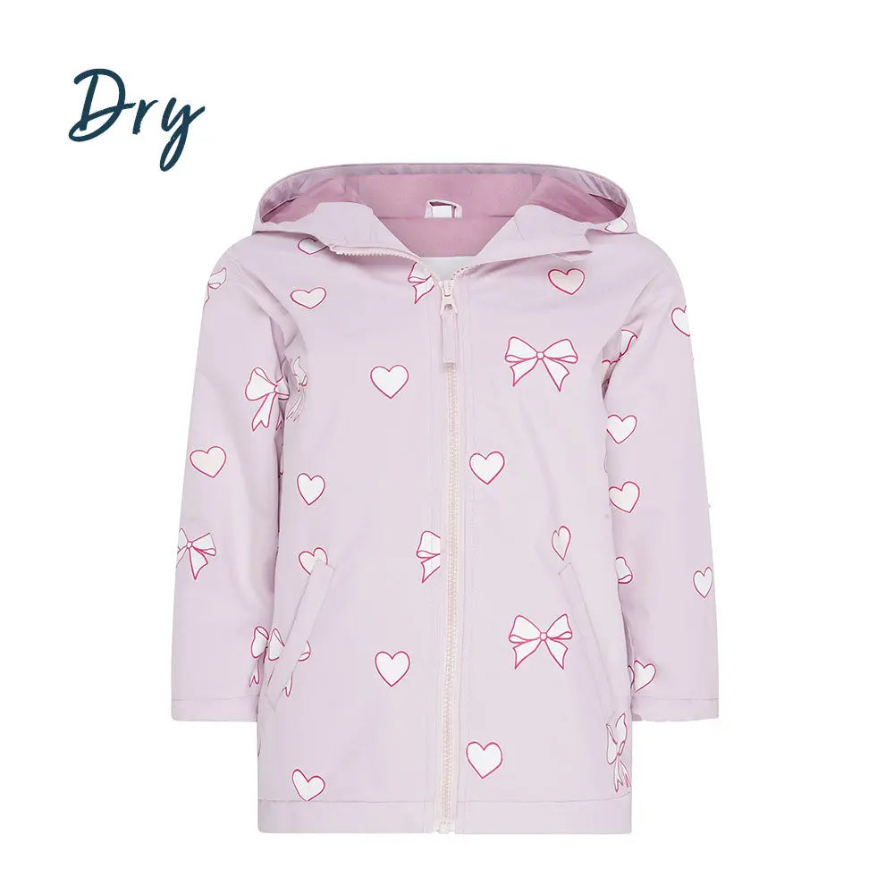 Front dry view of the pink bows and hearts color changing raincoat by Holly and Beau