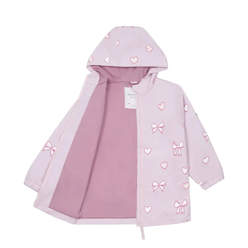 Inside lining of the pink bows and hearts color changing raincoat by Holly and Beau