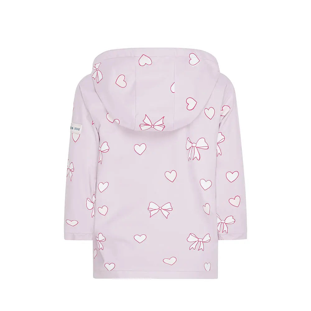 Back view dry colour changing kids raincoat in the pink bows and hearts design by Holly and Beau