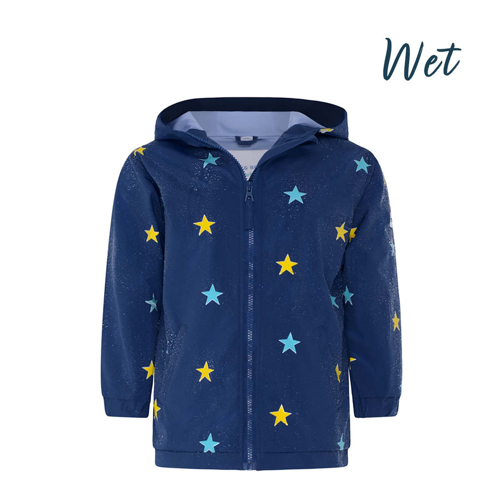 Blue star design kids color changing raincoat by Holly and Beau. Front view of the wet kids color changing raincoat