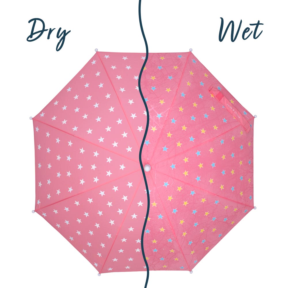 kids pink star color changing umbrella by Holly and Beau. Above view of the umbrella with a wet/dry comparison. Stick kids color changing umbrella.