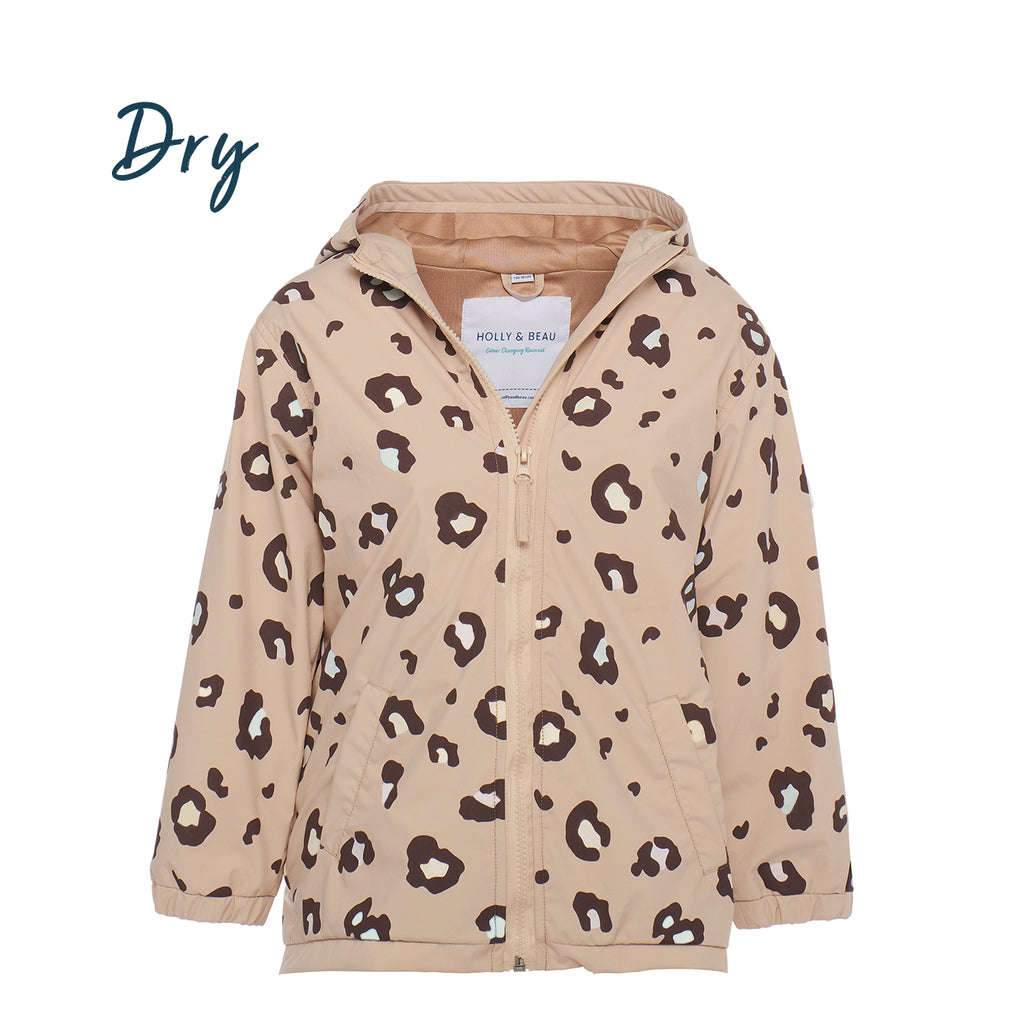 kids color changing rain jacket in leopard print design. This kids color changing rain jacket changes color when it comes into contact with water. Fun gift for little girl 